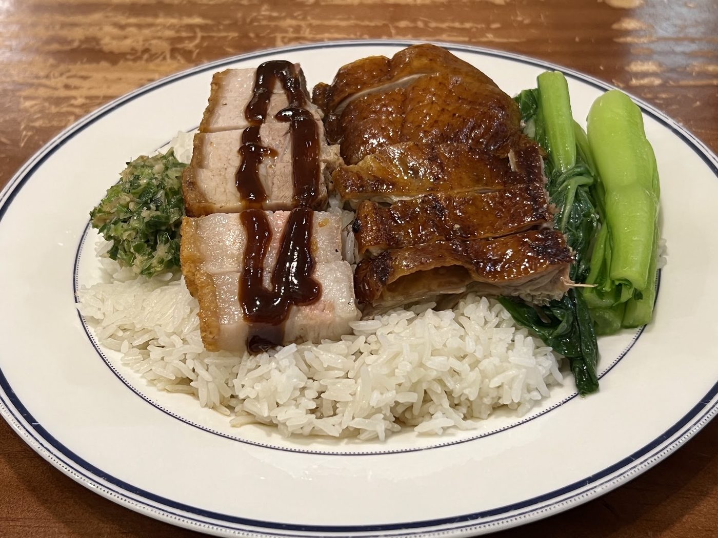 Roast duck carved and glazed with plum sauce