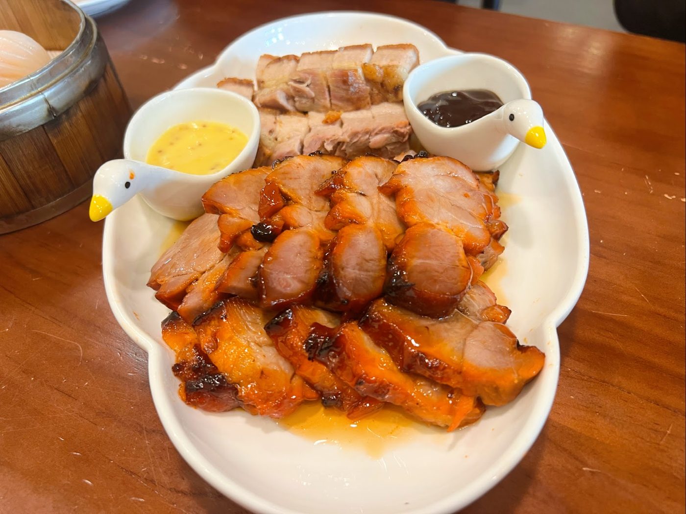 Roast meats combo platter with crackling skin